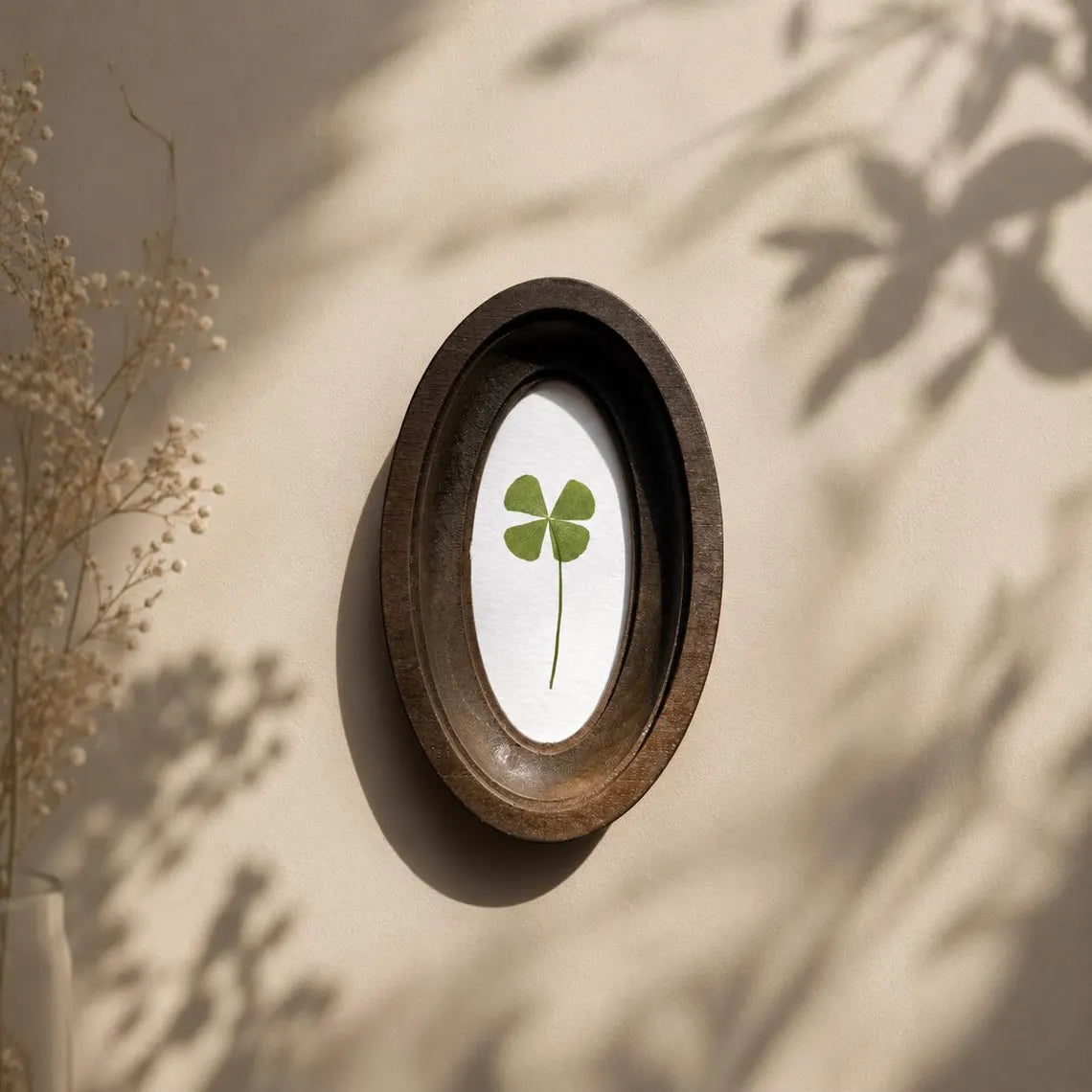 Four-leaf clover in oval frame, good luck charm, pressed clover, handmade botanical decor